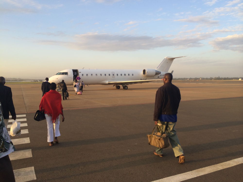 300-_walking_to_airplane_to_nairobi.jpg